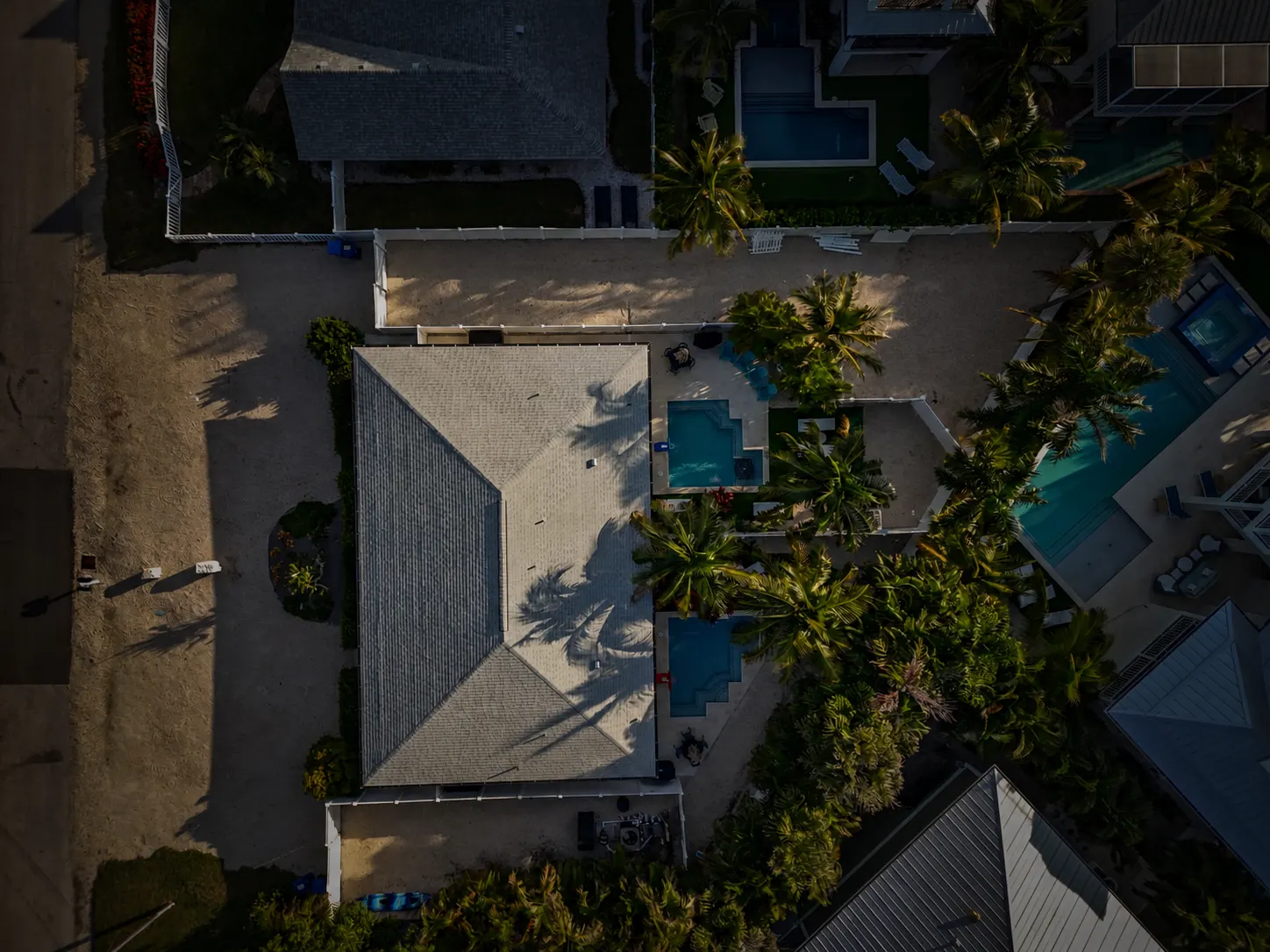 Aerial top-down view of the property and pool